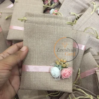 Jute Pouch With Flowers And Ribbon