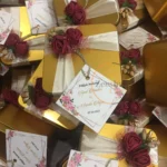 Mahroon Flower Tin Box With Ribbon And Tag