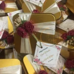 Mahroon Flower Tin Box With Ribbon And Tag